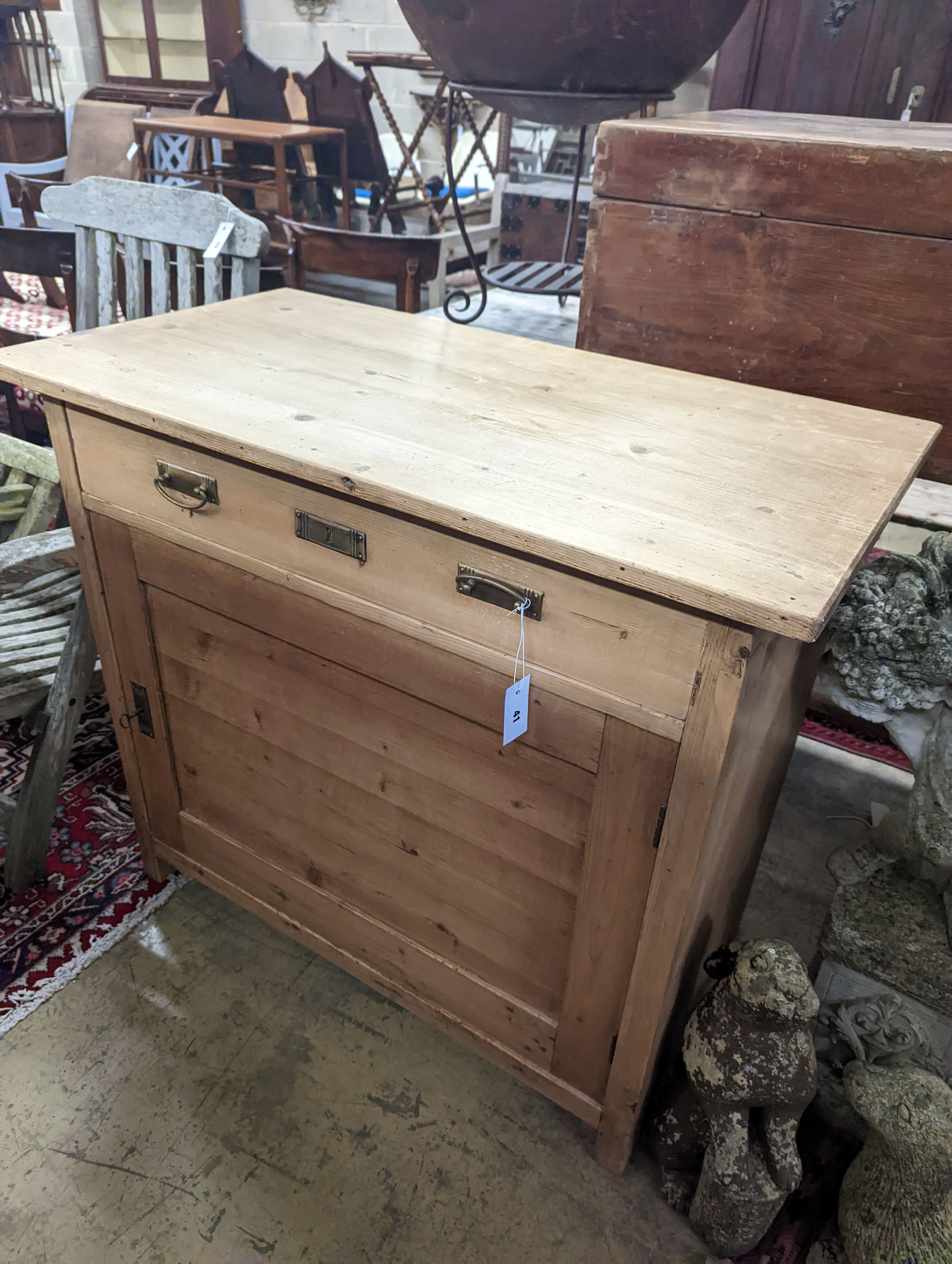 A 19th century East European pine side cabinet fitted one drawer, width 100cm, depth 54cm, height 89cm
